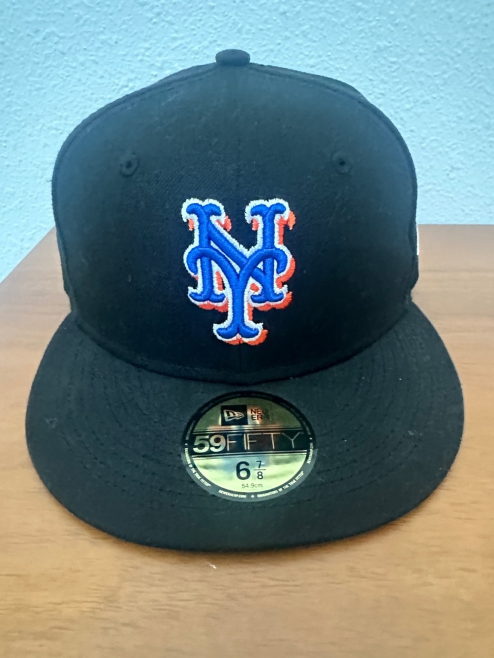 New Era Black New York Mets Fitted Cap with Blue and Orange Logo